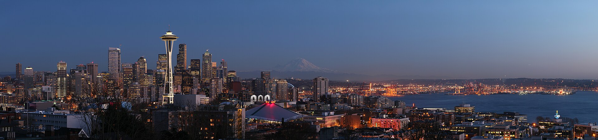 The Seattle skyline at dusk with Mount Rainier behind